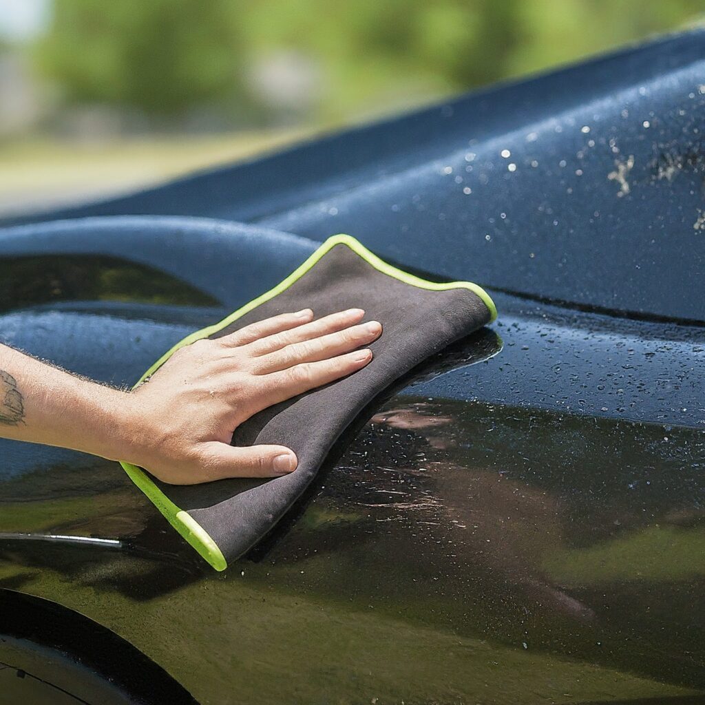 Wash Your Car in the Summer man cleaning his car